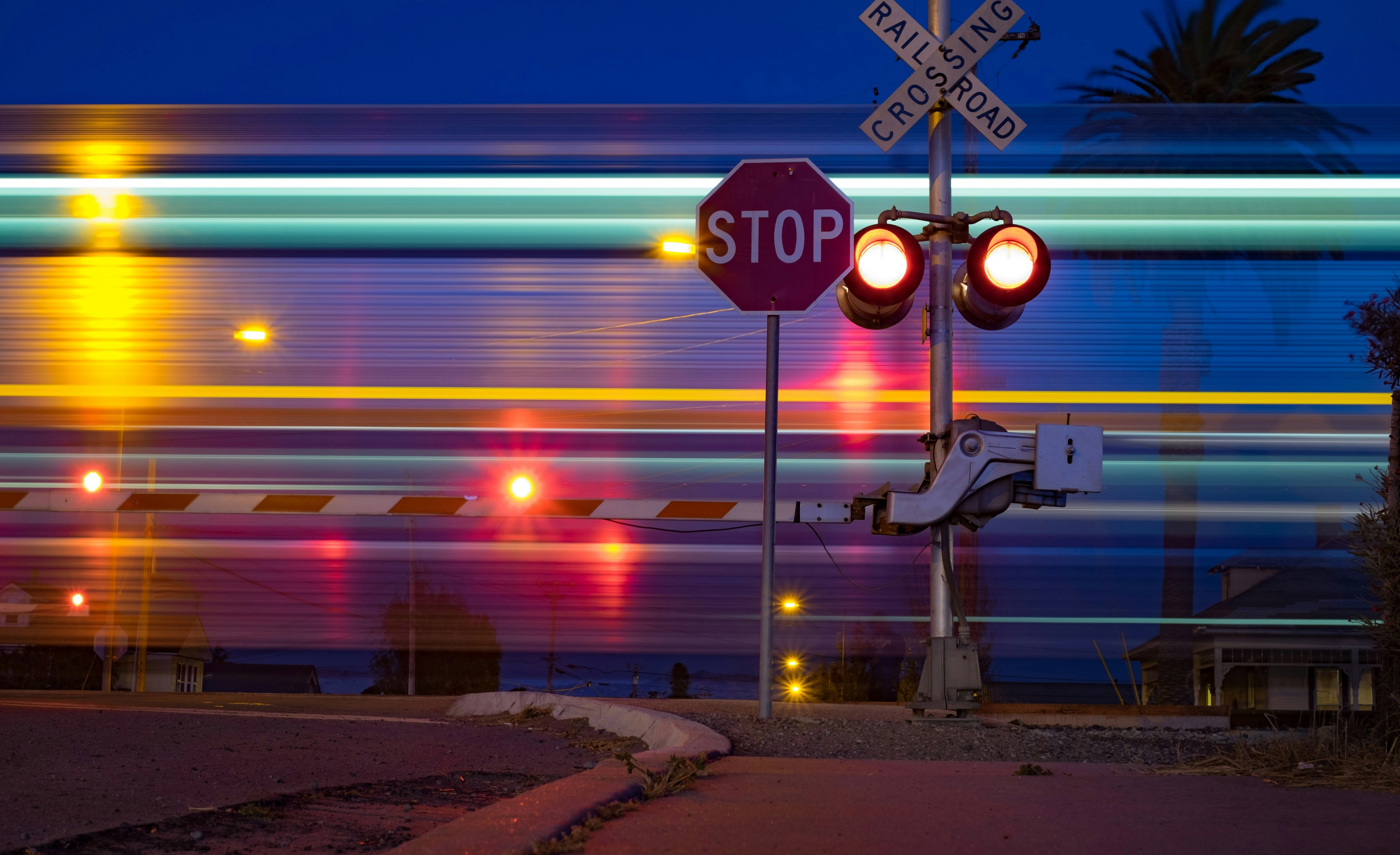 rail crossing at night