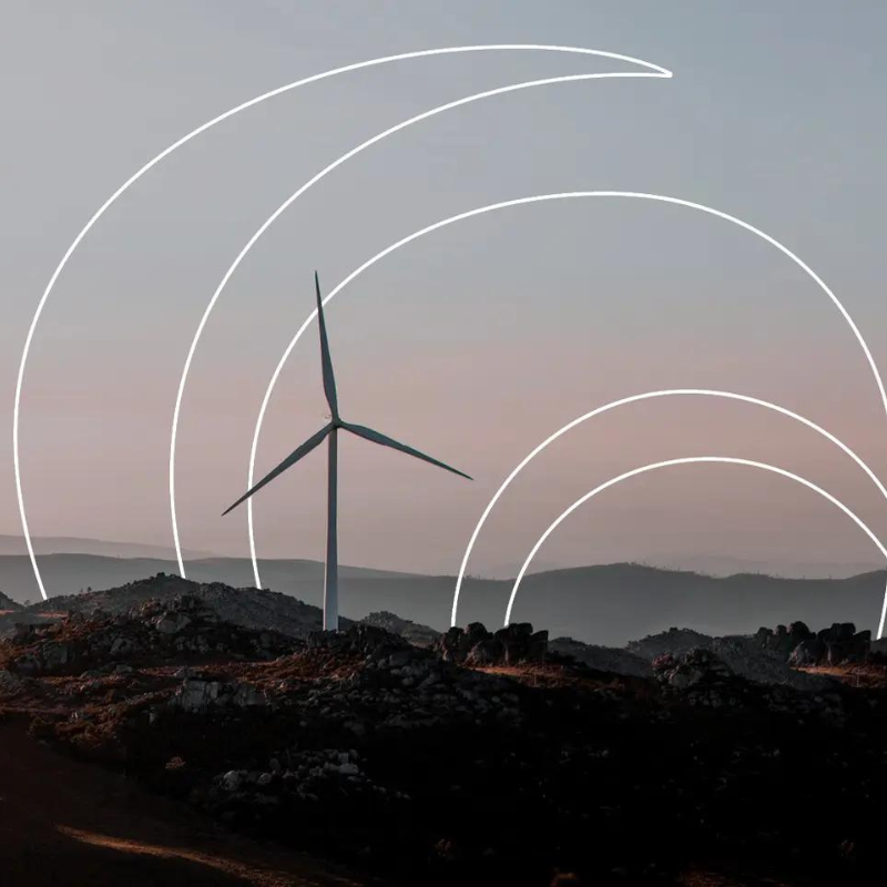 Wind turbine in rural location with the Baker Tilly International logo added to it