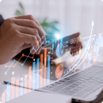 Graphs and charts rendered on top of a laptop keyboard