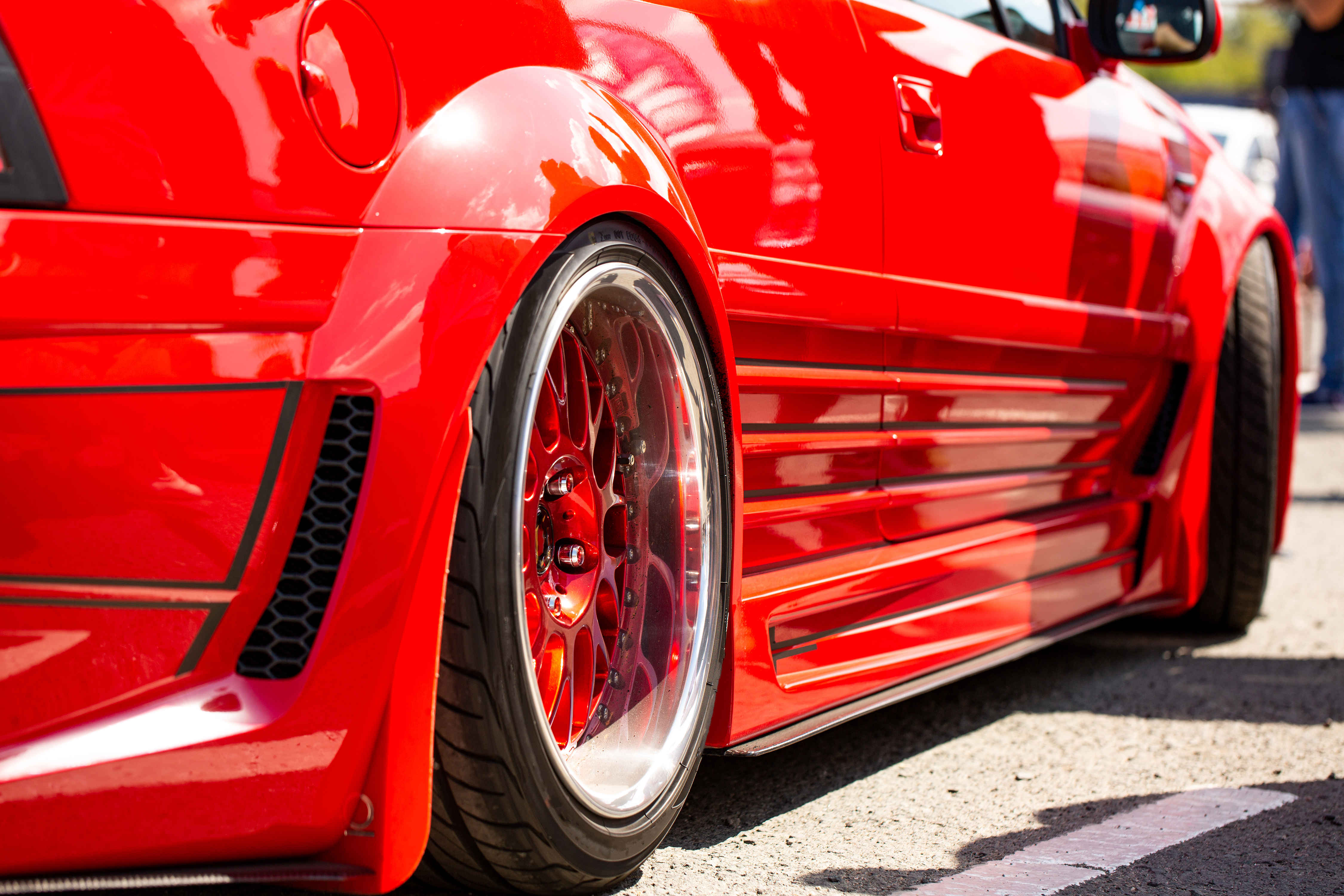 Red Sports Tuned Car Rear View Wheel